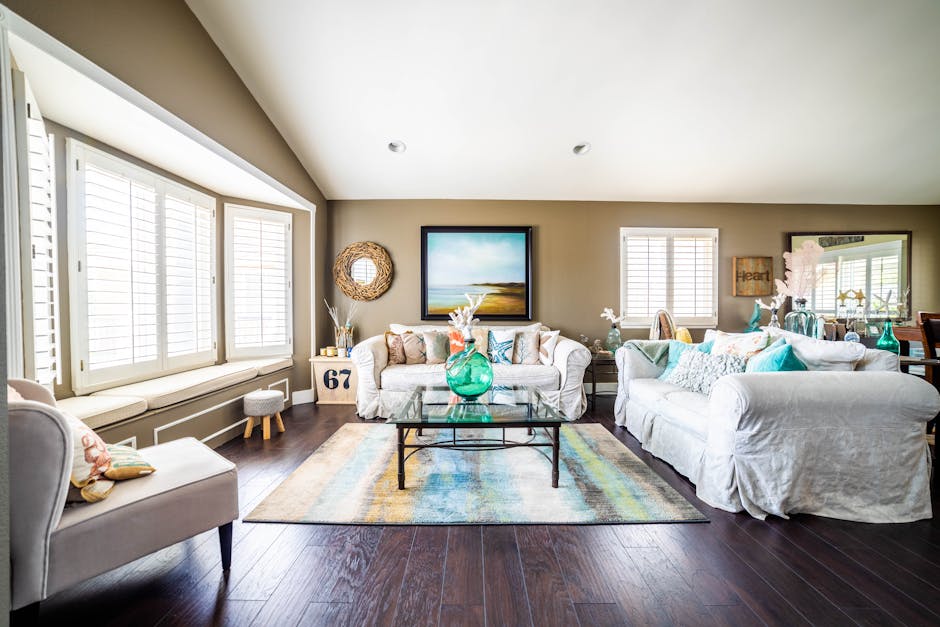 Cozy bright living room featuring wide modern windows