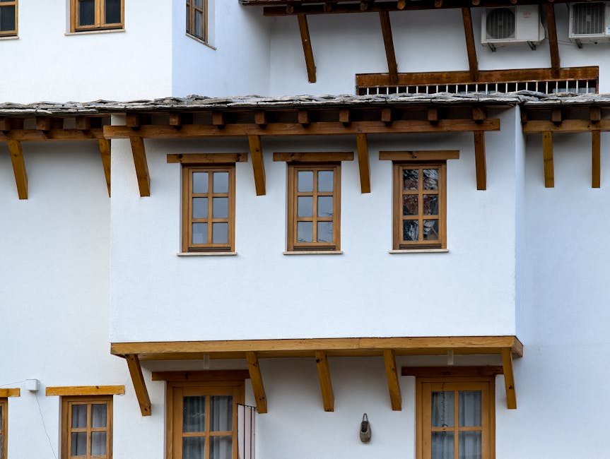 Modern house exterior featuring newly installed energy efficient windows